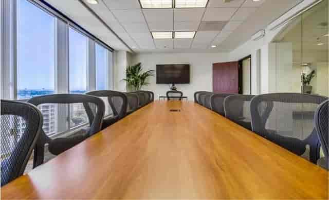 Modern conference room with wooden table for effective business meetings on Wilshire Blvd.