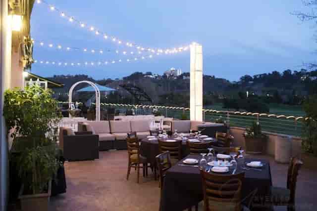 Elegant outdoor event space at Riverwalk Golf Club with soft lighting for upscale gatherings.