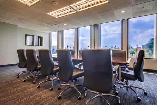 Modern conference room with large windows at Lake Avenue Executive Suites, Pasadena.
