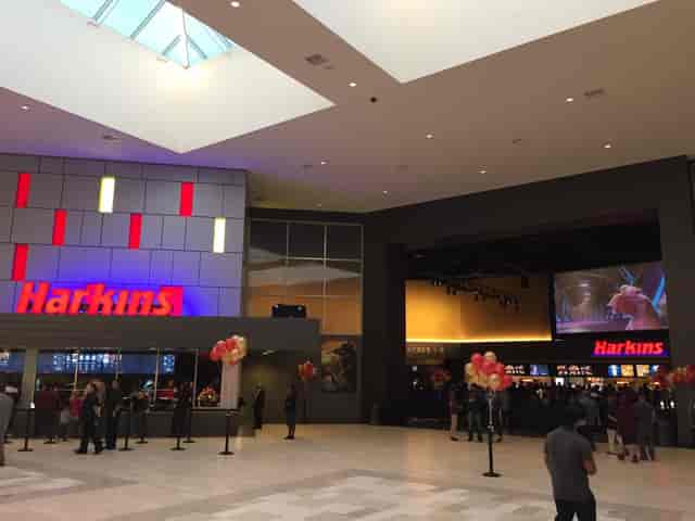 Harkins Theatres Cerritos 16 lobby with vibrant decor, ideal for private screenings and events.