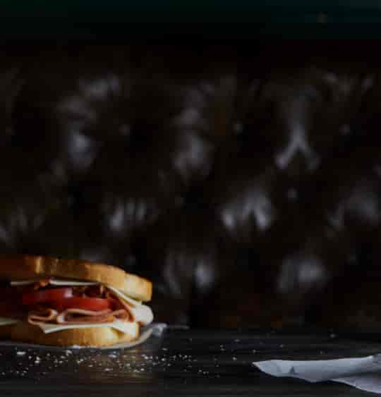 Gourmet sandwich at Bowlero Cerritos, perfect for event catering and networking.
