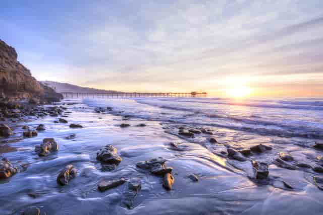 Coastal sunset at Sea & Sky Bar, perfect for weddings and outdoor events.