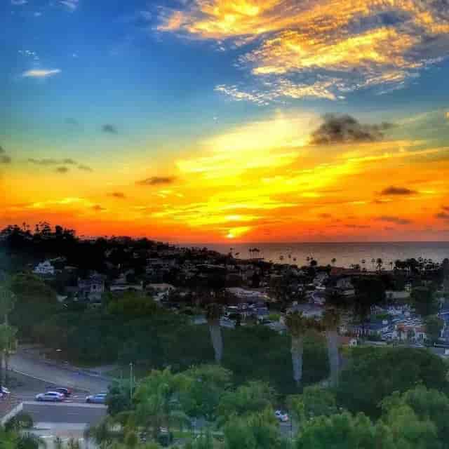 Stunning sunset at Sea & Sky restaurant, perfect for outdoor receptions and gatherings.