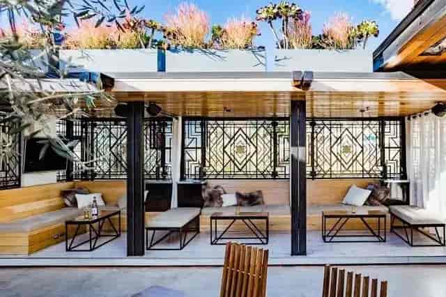 Stylish outdoor cabanas at Kettner Exchange for networking events and casual meetings.