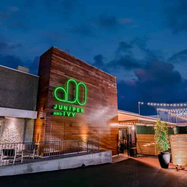 Modern covered patio at Juniper & Ivy with string lights for events and gatherings.