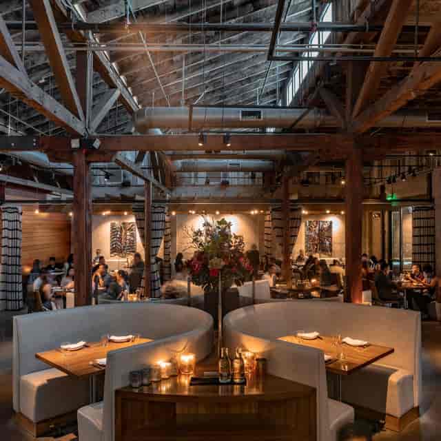 Stylish covered patio at Juniper & Ivy, perfect for events and gatherings.