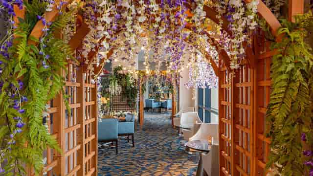 Rooftop Deck with floral archway, perfect for weddings and upscale events.
