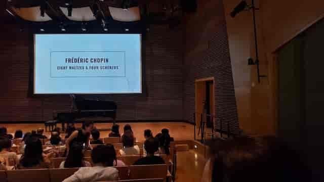 Westerbeck Recital Hall with grand piano, set for Chopin concert and lectures.