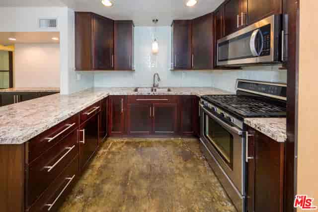 Modern kitchen with stainless steel appliances for events at Villa Parke Community Center.