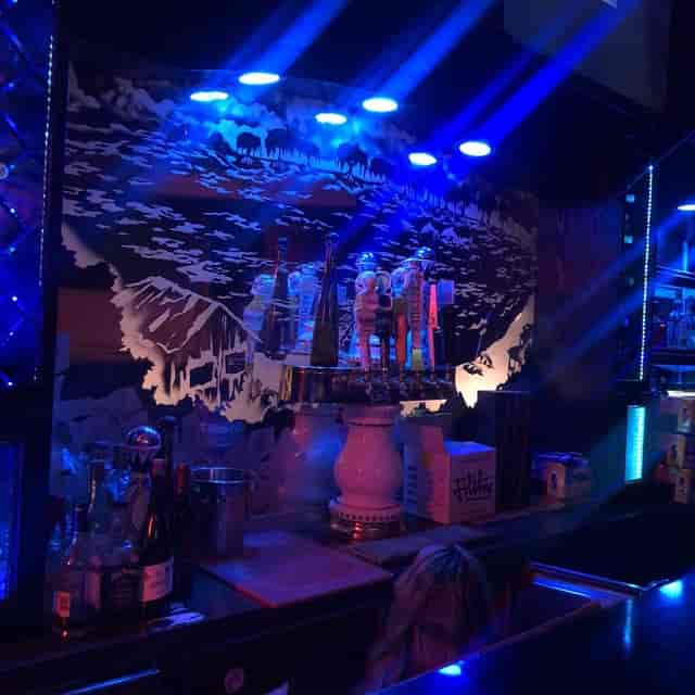 VIP table at CLUB db LOUNGE with illuminated beer taps, perfect for networking events.