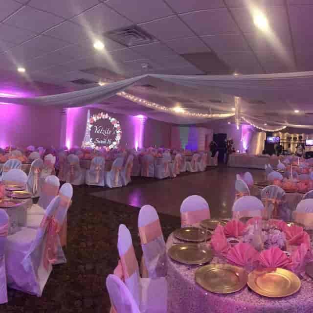 Whittier Hall event space with pink and gold decor, perfect for weddings and formal gatherings.