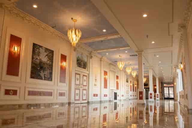 Elegant event hall with chandeliers, ideal for upscale meetings and galas.