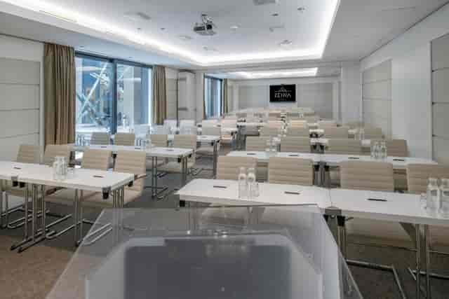Budapest Meeting Room with modern tables, ideal for professional events and workshops.