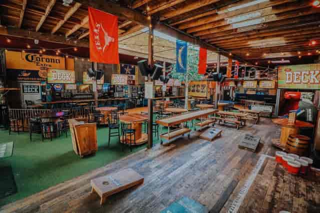 Mezzanine Table at Moonshine Flats: vibrant event space for social gatherings and team-building.