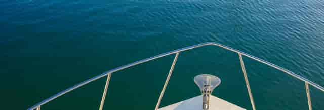 Main Enclosed Deck on Legacy Cruises, serene boat view for outdoor events and retreats.