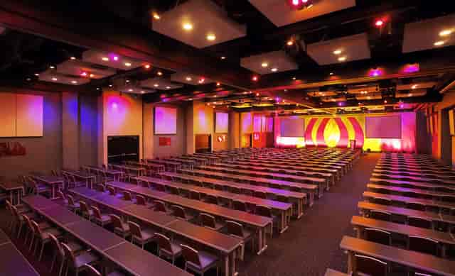 Main stage in San Diego conference room, vibrant lighting for corporate events.