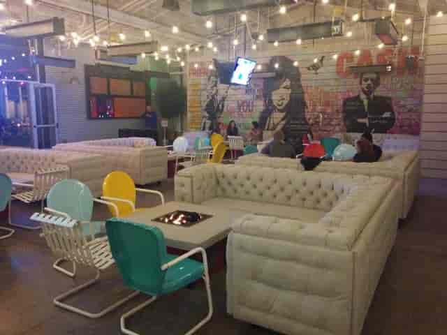 Fire pit lounge with cozy seating for casual gatherings and networking events.