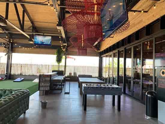 Gilbert Culinary Dropout event space with modern decor, ideal for networking and gatherings.