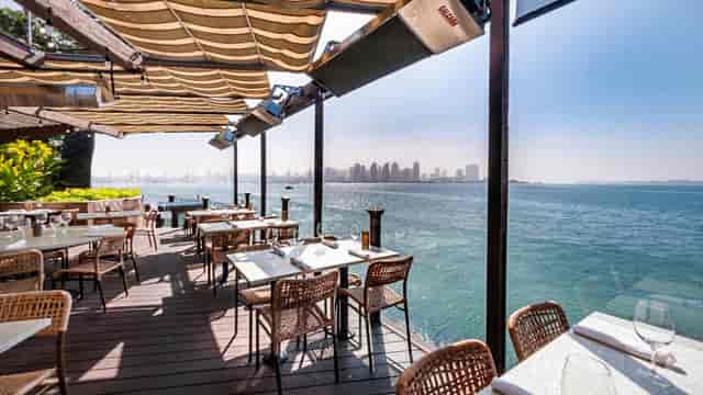 "Lanai at C Level Lounge: waterfront venue for events with scenic outdoor seating."