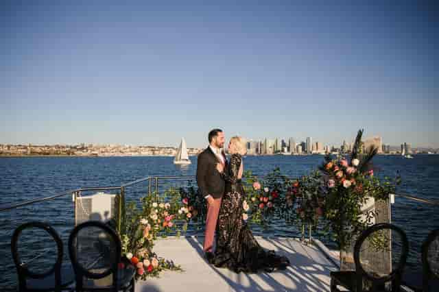 Bougainvillea Chic waterfront venue with floral stage, perfect for weddings and upscale events.