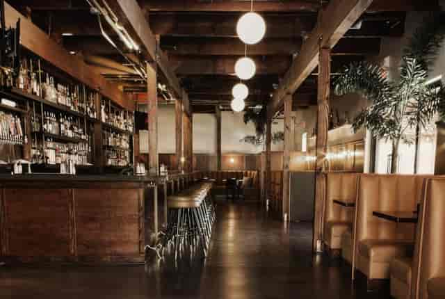 Stylish Social Hall patio with cozy seating, ideal for gatherings and networking events.