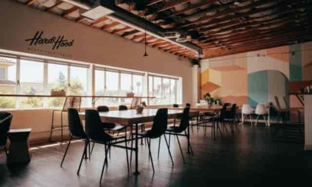 Modern conference room with natural light for workshops and networking events.