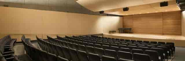 Tateuchi Hall auditorium with tiered seating, ideal for concerts and conferences.