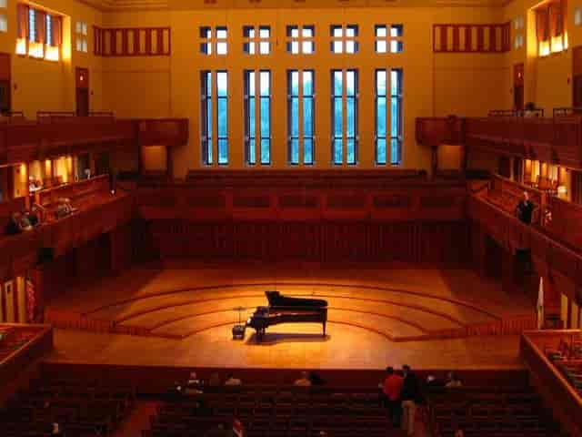 Tateuchi Hall concert venue with grand piano, ideal for music events and gatherings.