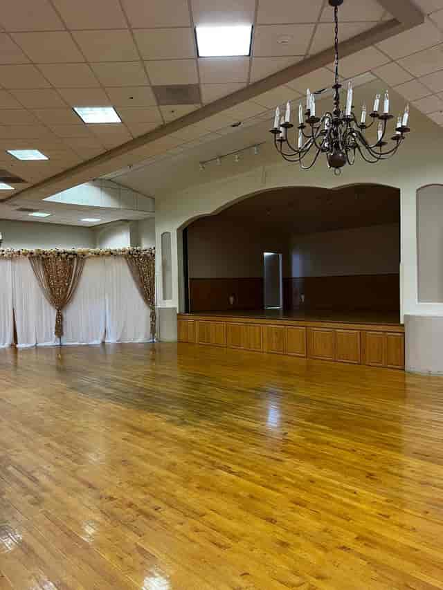 Spacious Newark Pavilion Hall #4 with polished wood floor, ideal for weddings and corporate events.