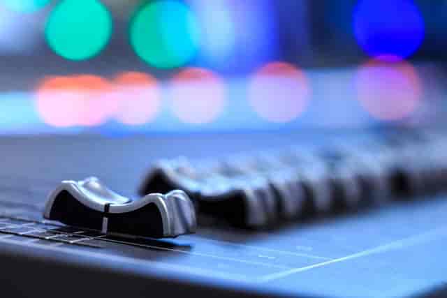 Close-up of audio mixing equipment at The Practice Place San Jose for live events.