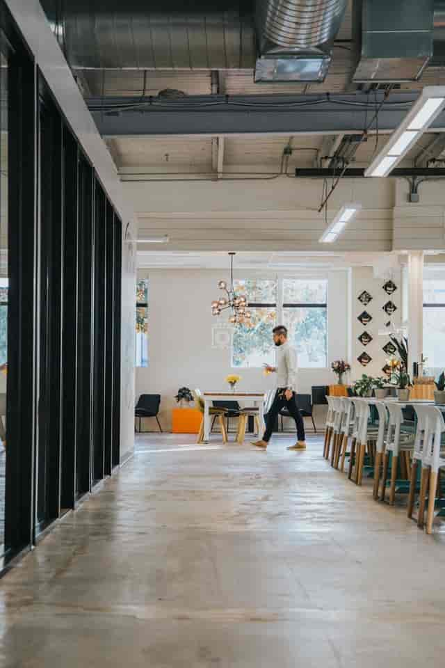 Modern private office event space with bright lighting for meetings and gatherings.