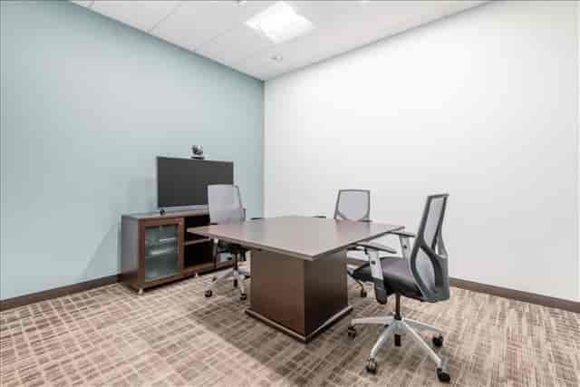 Modern minimalist meeting room with ergonomic chairs for conferences at 2305 Historic Decatur Road.