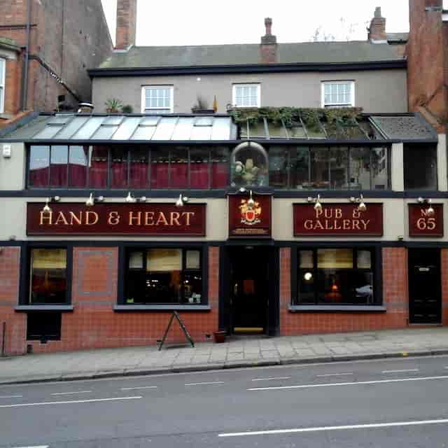 Charming pub venue with art, perfect for informal meetings and creative events.