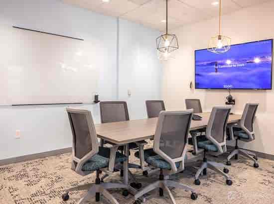 Modern conference room with ergonomic chairs for productive meetings in Cupertino.