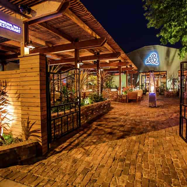 Outdoor venue at The Brunch Boutique, ideal for events with warm lighting and modern design.