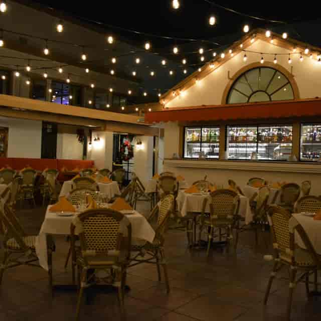 Banquet Hall at The Yellow Chilli, warm lighting, ideal for intimate events and gatherings.