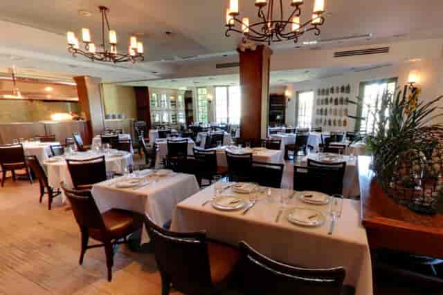 Private dining room at Dio Deka Restaurant, elegant decor for corporate events and gatherings.