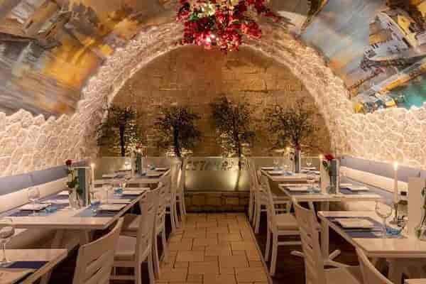 Main Dining Area at Opa! Authentic Greek with arched ceiling, ideal for events and gatherings.