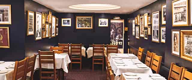Cozy dining space in Punjab Restaurant, ideal for private events and networking dinners.