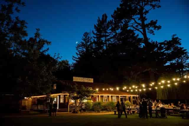 Outdoor farm tables at Radonich Ranch, perfect for evening events and gatherings.