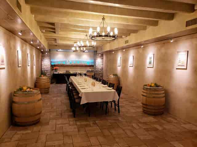 Elegant dining area in Los Gatos wine cellar for corporate events and intimate gatherings.