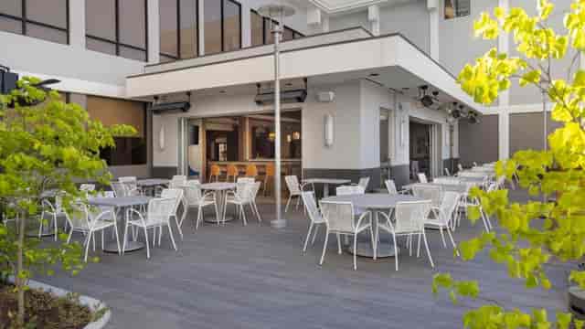 Outdoor event space at Holiday Inn San Jose with modern design and greenery.