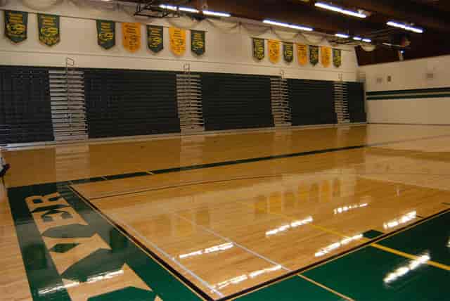 Emerald City Room gym with polished floors, perfect for events and sports activities.