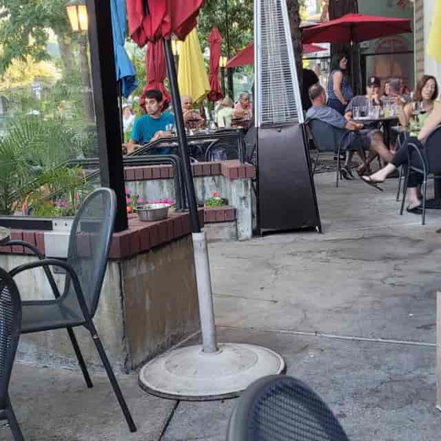 Outdoor dining patio at Willow Street Wood-Fired Pizza, perfect for networking events.