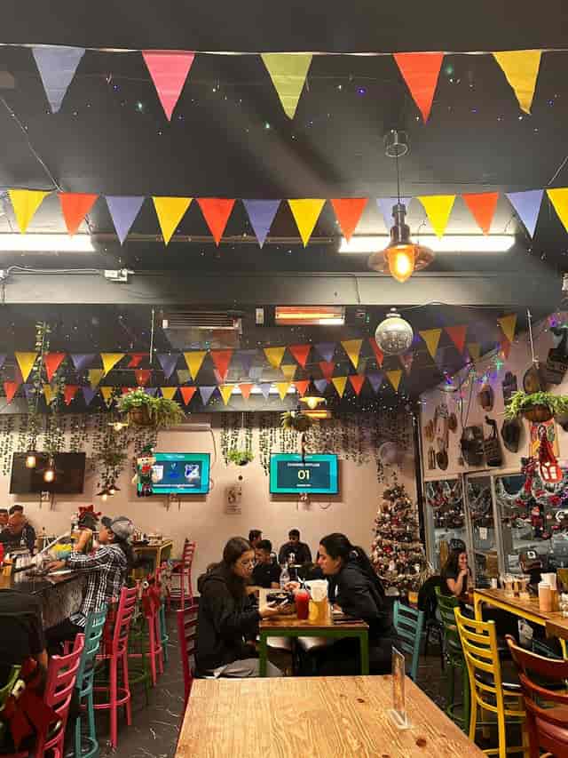 Vibrant dining space at Fonda Colombiana San Jose, ideal for casual gatherings and events.