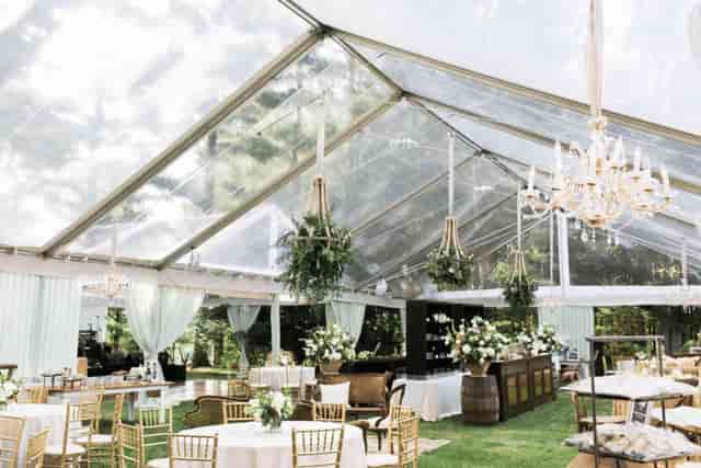 Elegant tented event space with chandeliers for weddings and corporate events in Singapore.