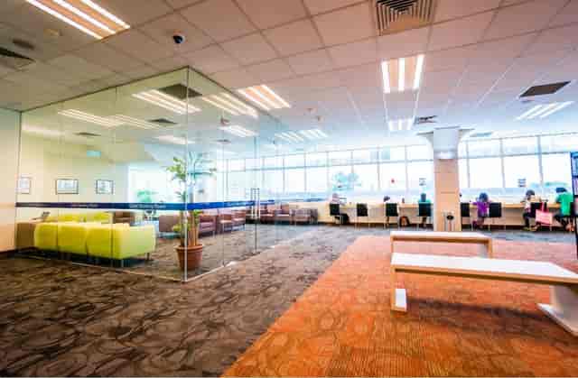 Modern open-concept meeting space in Jurong West Public Library for networking events.