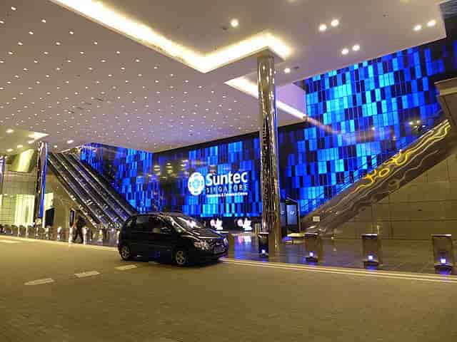 SNEF event at Suntec Singapore with modern blue-lit entrance and spacious layout.