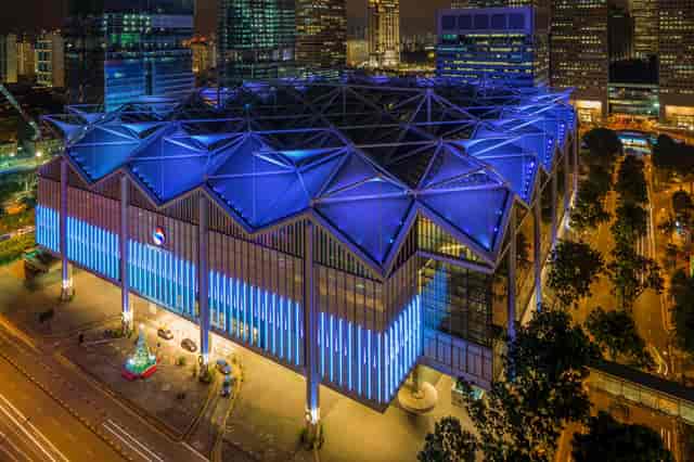 SNEF Event at Suntec Singapore, modern convention center with blue lighting, ideal for conferences.