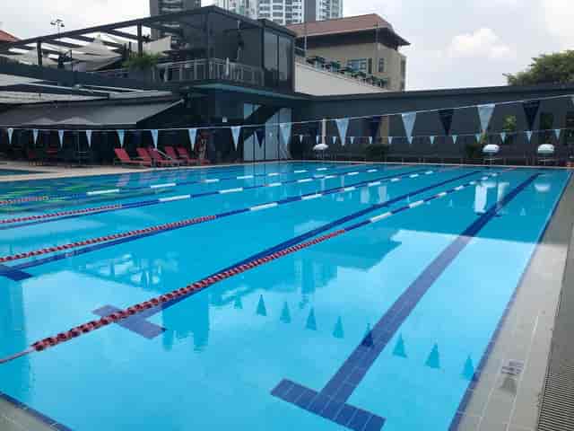 Pristine swimming pool at The American Club Singapore for outdoor events and team-building.